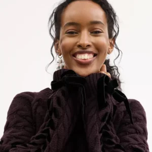 Pullover mit Zopfmuster und Schleife*COACH Best Sale